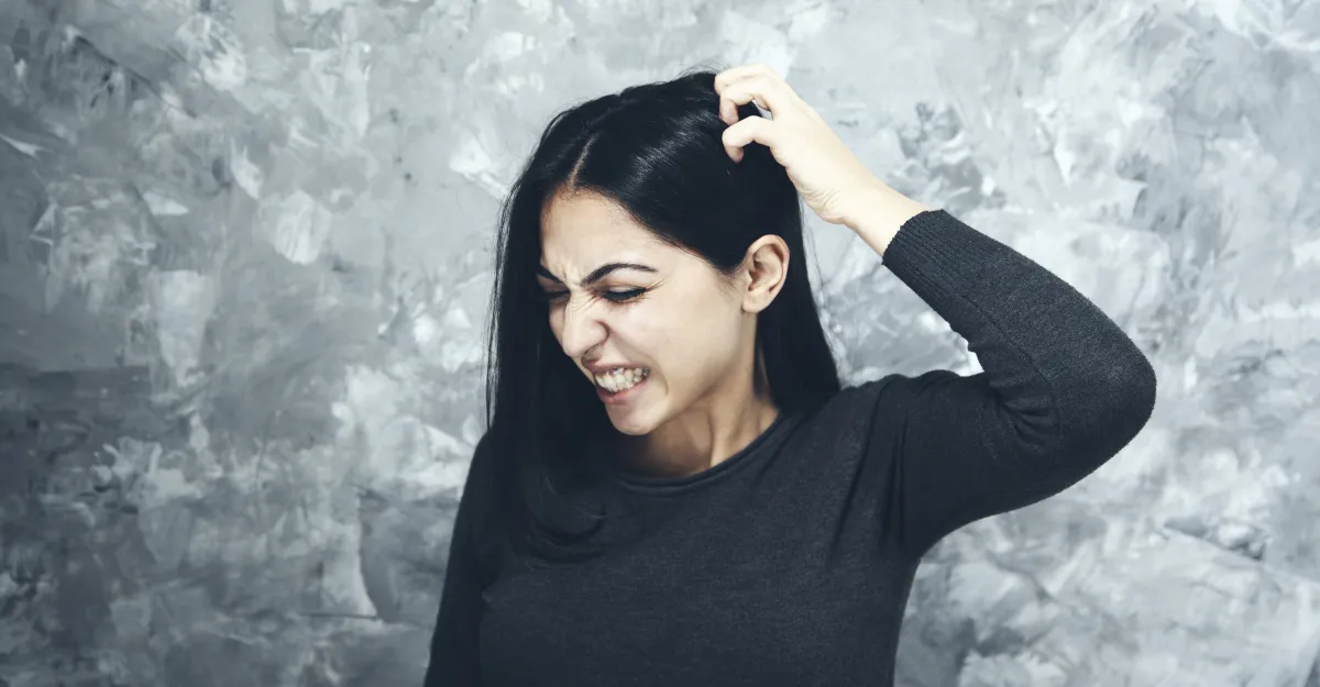 Understanding Scalp Allergies,
woman scratching her head, itching