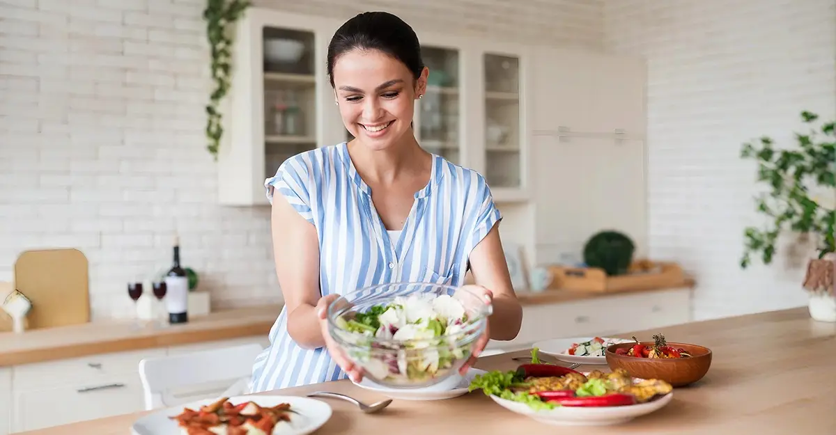 Nutrition for Hair Health in 40s, woman holding salad bowl