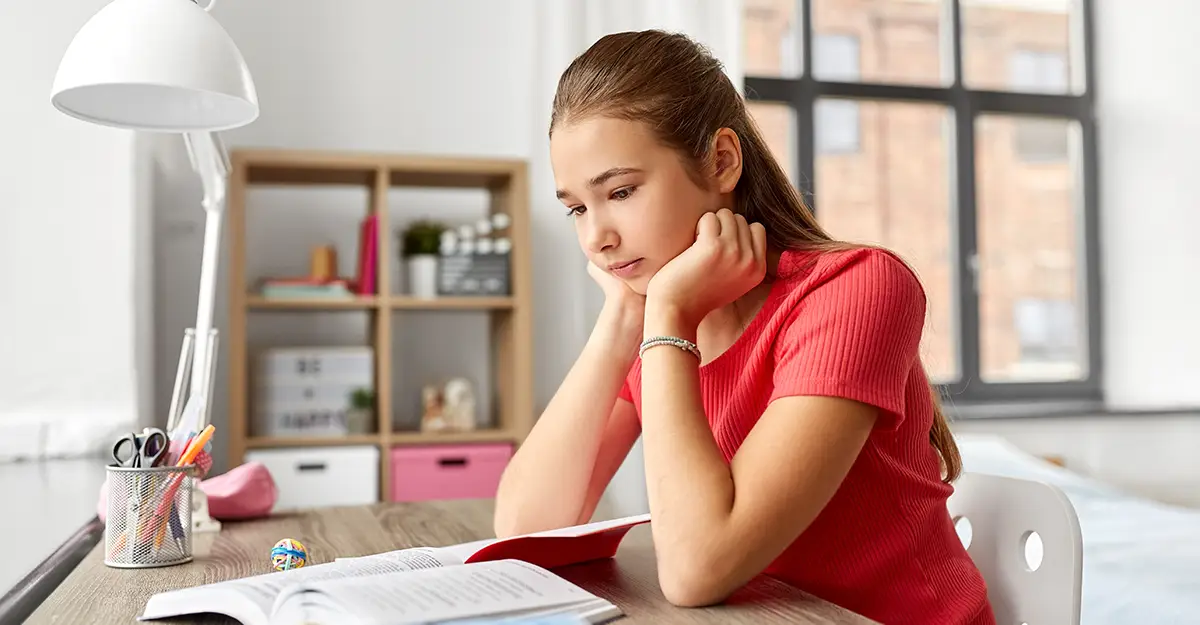 Stress management is important for managing hair loss, girl studying